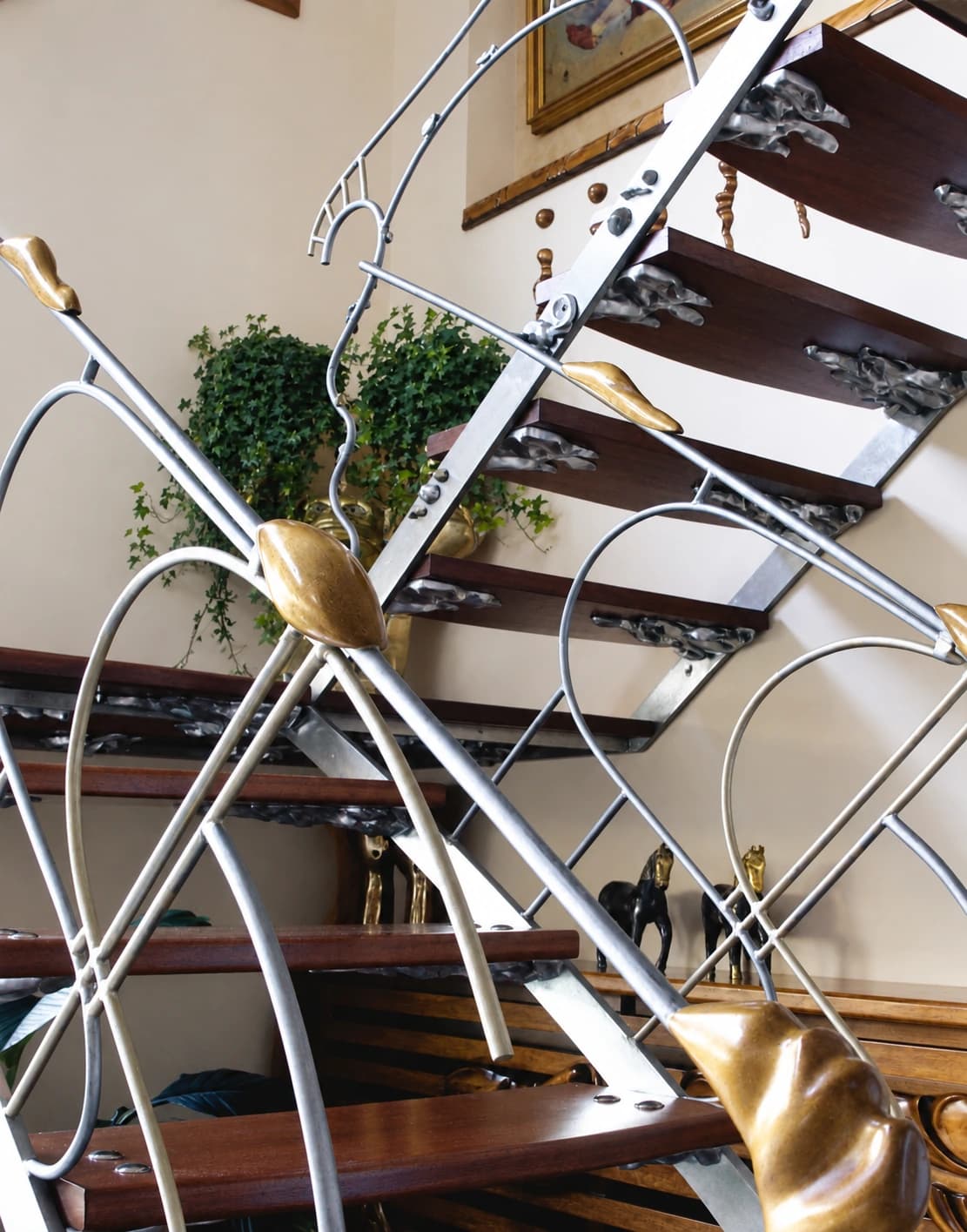Etiler House: Metal railing and timber tread detail of the staircase